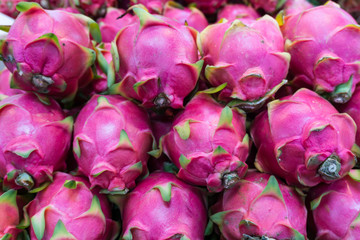 Fresh delicious dragon fruit on market stand at market in Thailand ,healthy fruit concept
