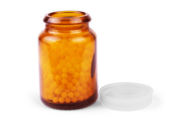 Transparent plastic bottle of vitamin  pills, isolated on white