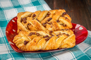 Danish pastry maple pecan with nuts and maple syrup