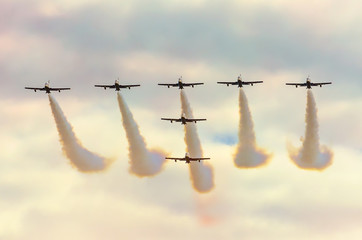 Aircraft fighter jets smoke the background of sky clouds