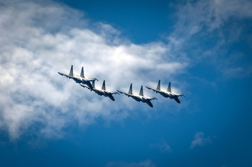 Aircraft fighter jets smoke the background of sky clouds