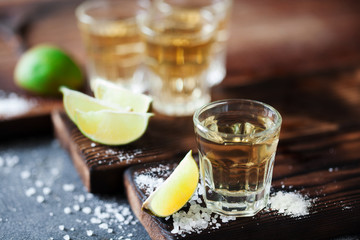 Tequila golden with lime and sea salt decorated with blackberry and mint