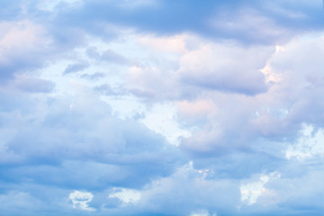 Fototapeta na wymiar Sky with blue and pink clouds