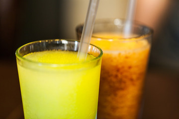 Close up view of lemon and strawberry iced beverages