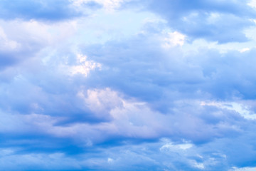 Obraz na płótnie Canvas Sky with blue and pink clouds