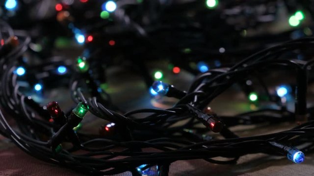 Blue, red and green lights for Christmas tree electric lights. Footage clip 4k