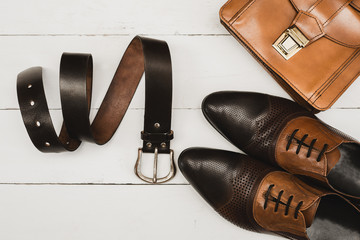classic men's accessories. Shoes with handbag and belt