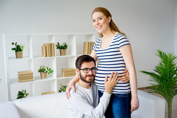 Obraz na płótnie Canvas Pregnant woman with husband