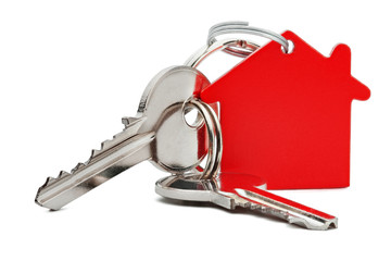 Estate concept, red key ring  and keys on isolated background