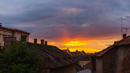 Awesome scenery of sunset over the ancient european city Sibiu in Romania