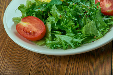 salad from leaves of wild radish