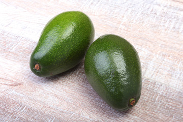 Fresh, green Avocado isolated on a white background.