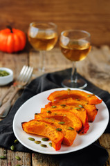 Rosemary honey roasted pumpkin wedges with pumpkin seeds