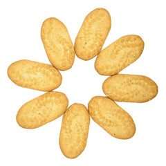 Flower shape made of biscuits on white background