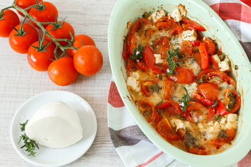 Bouyourdi - Greek main dish with feta cheese , red pepper and tomatoes