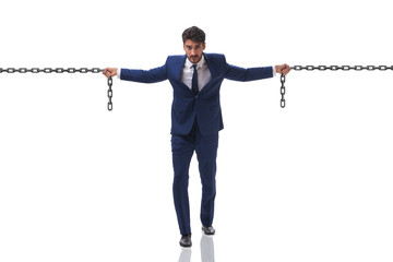 Businessman holding chains in business concept