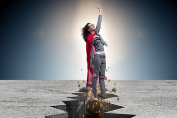 Superhero businesswoman escaping from difficult situation