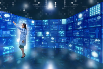 Doctor in telemedicine concept pressing buttons