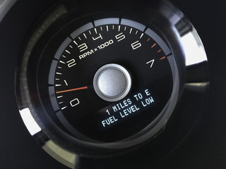 one mile to empty automobile tachometer