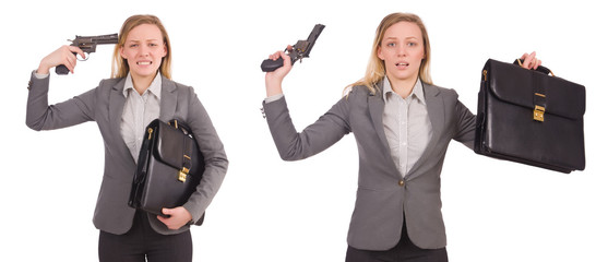 Businesswoman with gun isolated on white