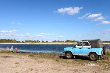 Fototapeta na wymiar Fishermen on the Big Ostrovoye lake in the Mamontovsky district of the Altai Territory.