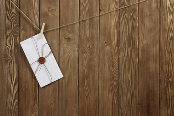 Envelope pinned to rope