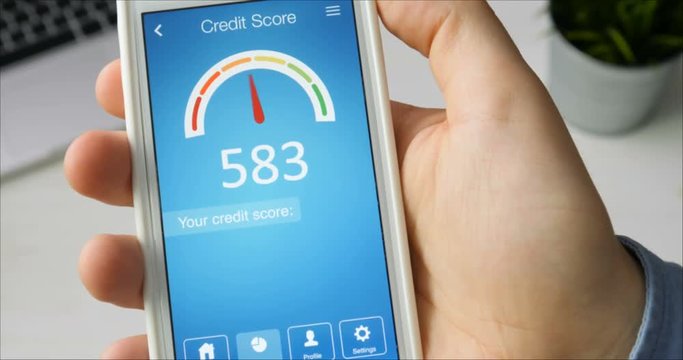Checking credit score on smartphone using application. The result is VERY GOOD