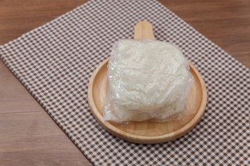 sticky rice served on wood plate