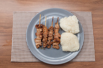 grilled pork skewer chop with sticky rice
