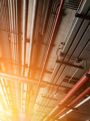 pipe line and electrical engineering pipe

red water pipe line and electrical electrical system in building, cable wiring. Mechanical engineering pipe. Electrical line. Communication cable.
