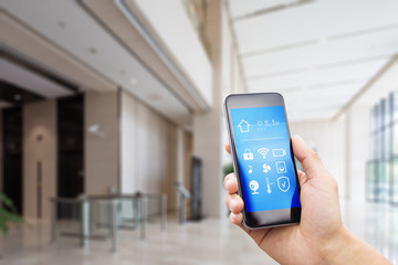 mobile phone with smart hone apps in modern hall