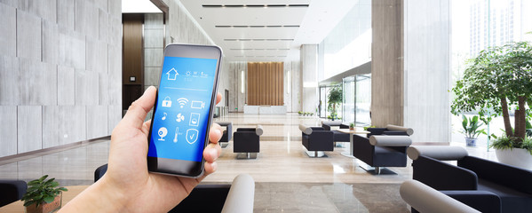 mobile phone with smart hone apps in modern hall