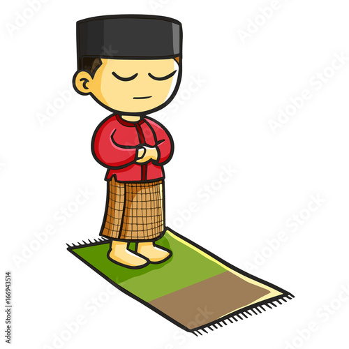  Man praying in muslim  way or Sholat  in Bahasa Indonesia 