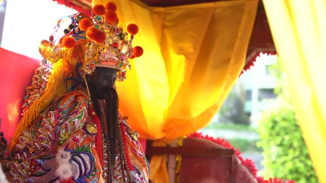 Taipei, Taiwan-30 May, 2017: 4K Xia-Hai City God statue worshipped in a cultural procession of Taiwan's traditional Festival. God Cheng Huang Ye is a tutelary deity guardian and protector of town.-Dan