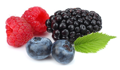 mix of blueberries, blackberries, raspberries isolated on white background