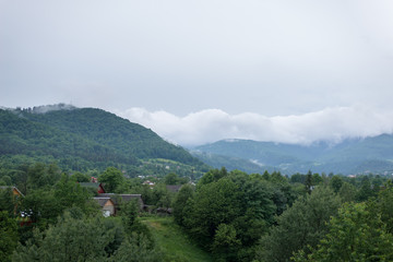 Fototapeta na wymiar Over mountains of a cloud