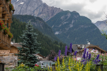 Majestic scenery of rocky mountains at golden sunset in Dolomites National Park
