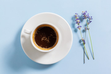 Coffee with flowers composition on the table