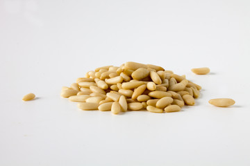 Isolated pile of pine nute on white background