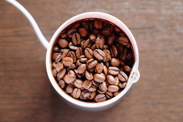 coffee beans electric coffee grinder. the view from the top.