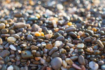 Natural colorful stone on the beach