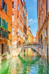 Views of the most beautiful channel of Venice, narrow streets, houses .Italy.
