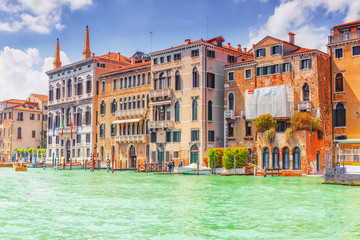 Views of the most beautiful canal of Venice - Grand Canal water streets, boats, gondolas, mansions along. Italy.