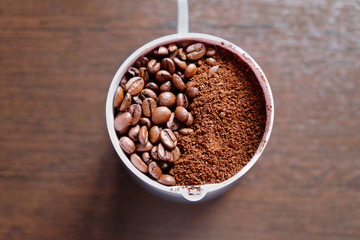 coffee beans electric coffee grinder. the view from the top.