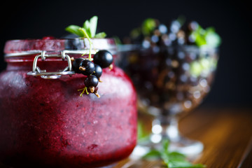 Berry ripe black currant with jam