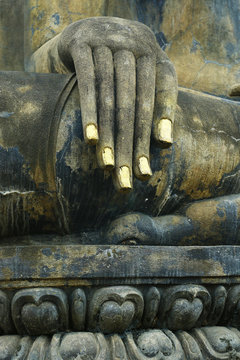 hand of statue of buddha,in the historical park of Sukhothai,Thailand 