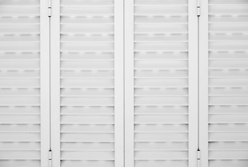 Typical white window shutters on portugese property