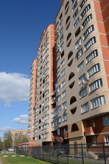 Naklejka premium Multi-apartment house on Dzerzhinsky Street in Kokoshkino, Novomoskovsk Administrative District of Moscow.