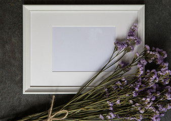 white wood frame with dry flower