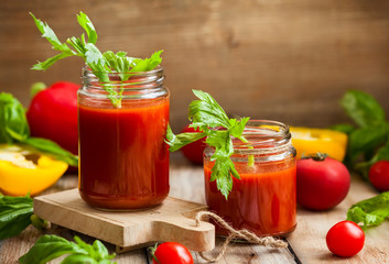 Spicy tomato drink in jars